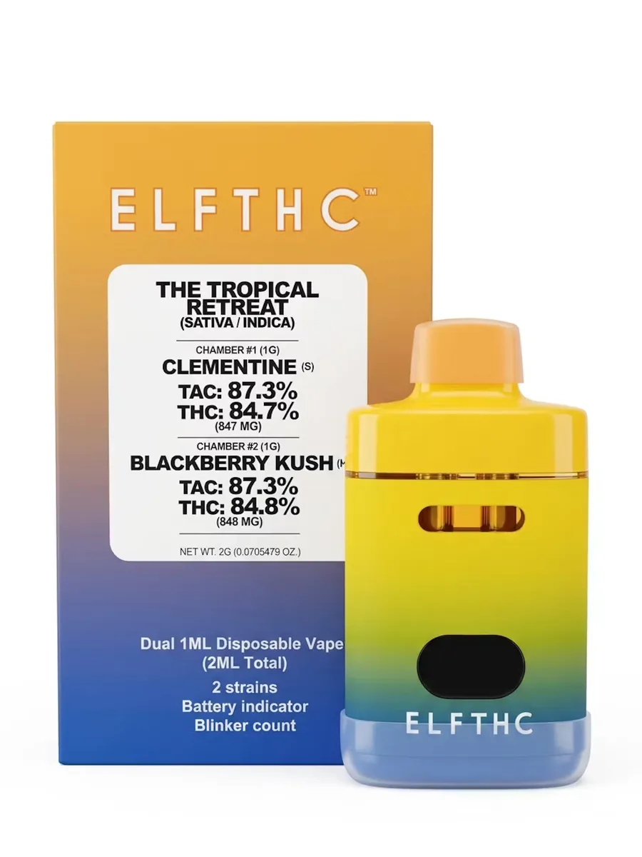 An ELFTHC dual chamber 2 gram disposable vape in a yellow to blue gradient, beside its box for The Tropical Retreat with Clementine and Blackberry Kush