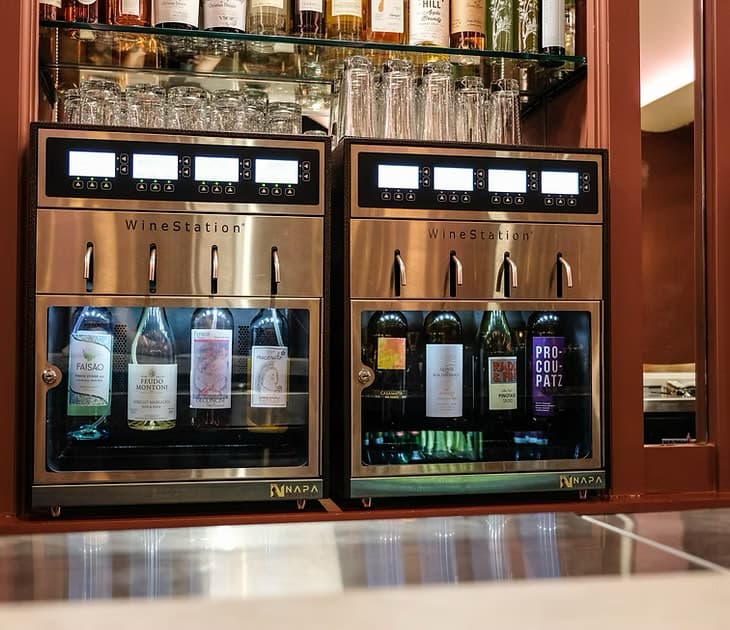 The self-serve WineStation taps at Tootles & French in Astoria, pouring by the glass from bottles kept perfectly preserved
