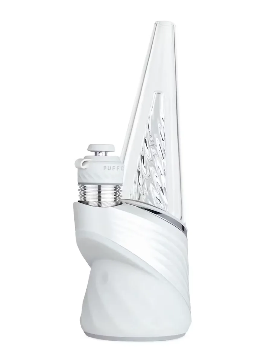 A white Puffco electronic rig with a clear ripple glass top and a polished silver chamber