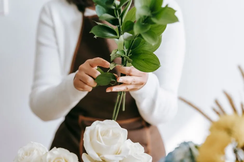 florist carefully arranging flowers - queens ny florist